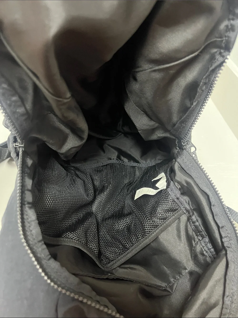 lululemon athletica black backpack with front zip pouch